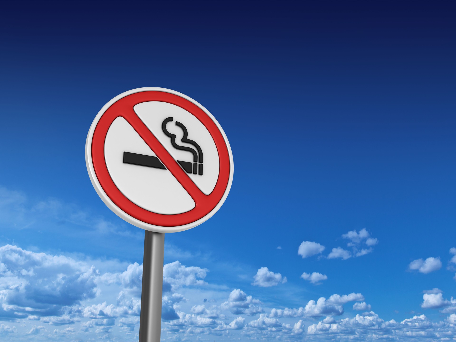 NO SMOKING Road Sign - Sky Background - 3D Rendering